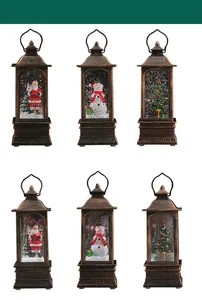 Detail view of vintage bronze Christmas lanterns with Santa and snowman figurines