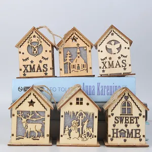 Set of 6 wooden LED Christmas tree house pendants with laser-cut festive patterns