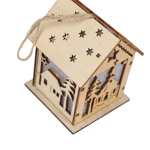 Hanging wooden LED Christmas house ornament with star cutouts and warm glow for holiday decor