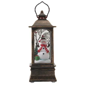 Retro bronze Christmas lantern with snowman scene and LED light for table decoration