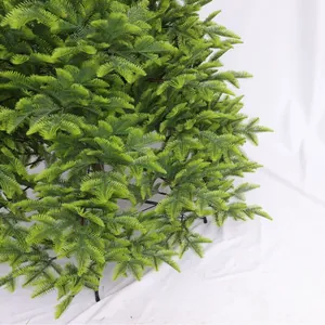 Lifelike PE Norfolk Island pine Christmas tree with realistic green needles and metal stand