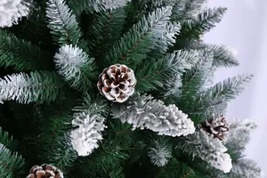 Detailed view of snowy PE pine needles with realistic pine cones for Christmas decor