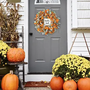 Artificial lamb's ear wreath with orange berries and Hello Fall sign for front door decor