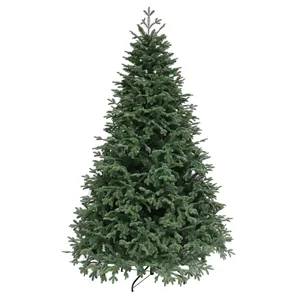 Detailed view of dense dark green PVC pine needles on an artificial Christmas tree