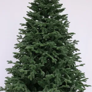 Deep green artificial Christmas tree with dense PVC needles and realistic cone shape