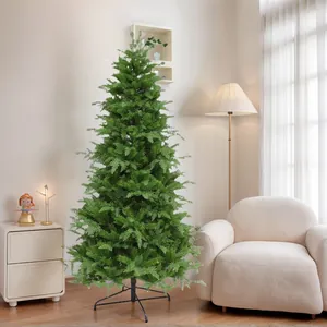 Detail of lush mixed leaf artificial Christmas tree with sturdy black metal base stand