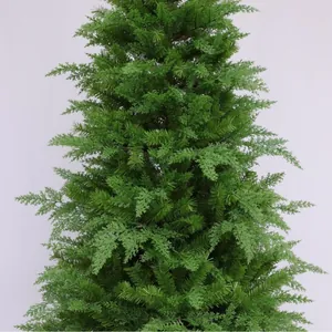 Lush artificial mixed leaf Christmas tree with realistic green needles in a tapered shape