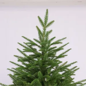 Realistic artificial PE and PVC Christmas tree showing dense dark green branch tips