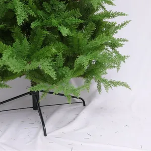 Artificial mixed leaf Christmas tree with lush green PVC needles and a stable black metal stand