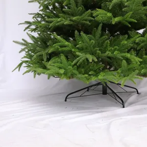 Artificial PE and PVC mixed Christmas tree with stable black metal four-legged stand