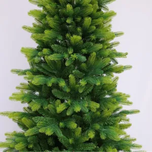 Lush green PE and PVC artificial Christmas tree with dense needles and realistic conical shape