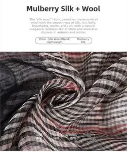Close-up of lightweight silk-wool blend scarf showing fine black, white, and red stripes