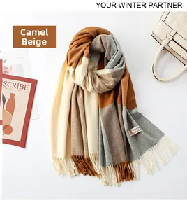 Detailed flat lay of camel beige checkered cashmere scarf with fringe and care label