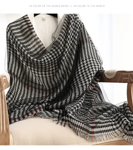 Classic houndstooth silk scarf with subtle red stripes and frayed tassel edges detail