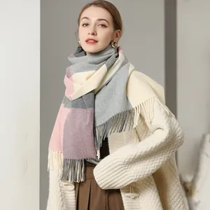 Elegant women's wool blend scarf with geometric color block patterns and fringe edge