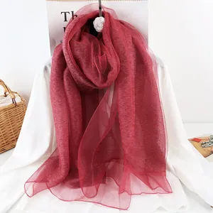 Luxurious burgundy mulberry silk sunshade shawl with elegant pleated texture and soft drape