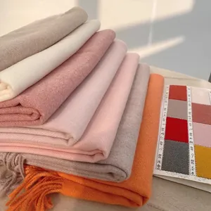 Thick solid color cashmere shawl scarf for women featuring decorative long tassels