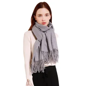 Classic grey cashmere-like scarf with long tassels for autumn and winter warmth