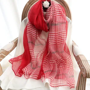 Silk wool scarf with red and white plaid pattern in a lightweight, elegant long shawl design