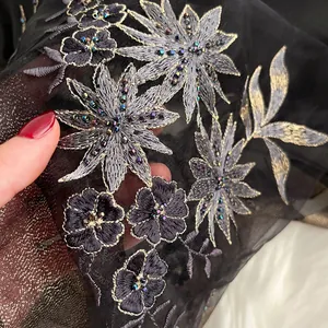 Exquisite black silk wool scarf with silver floral embroidery and pearls on sheer fabric
