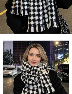 Close-up of black and white houndstooth scarf with soft fringe and logo patch