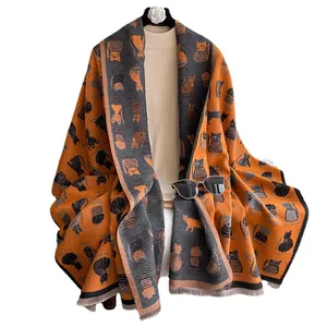 Orange and grey cashmere-like scarf with cute cartoon cat patterns and fringe details