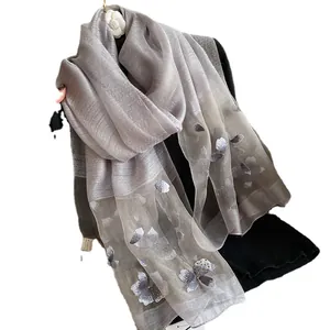 Gray silk wool scarf for women with elegant floral embroidery and sheer metallic texture