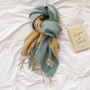 Winter double-sided cashmere-like scarf with fringe in blue and khaki tones