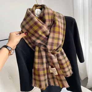Winter plaid scarf with pink yellow check patterns and fringe trim for women