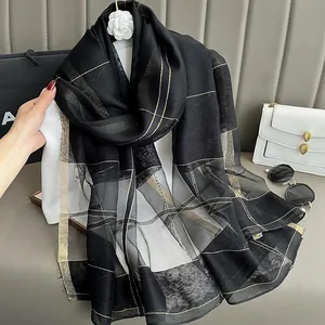 Luxurious black silk mohair scarf with gold and silver plaid pattern for women