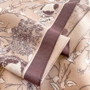 Macro detail of French vintage floral jacquard cashmere scarf showing thick fabric texture