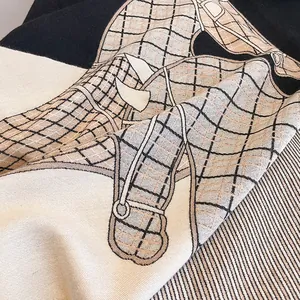 Luxurious horse print pashmina shawl with classic beige and black cashmere texture