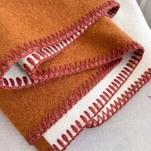 Double-sided caramel cashmere-like scarf with thick texture and hand-stitched edges