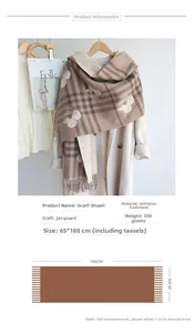 Detailed view of jacquard faux cashmere shawl with elegant floral and plaid patterns