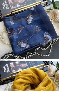 Détail d'une écharpe en soie avec broderie florale délicate et perles élégantes