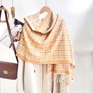 Classic checkered knitted scarf with tassels in mustard orange and cream white colors