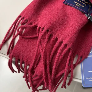 Classic deep red wool scarf for winter featuring soft tassels and a premium woven texture