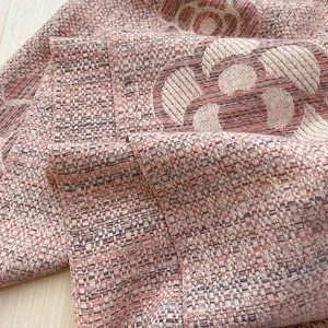 Close-up of pink and purple camellia jacquard pattern on thick tweed scarf texture