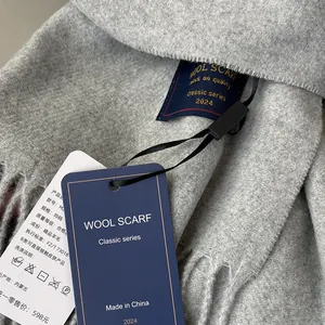 Detail of Australian wool scarf with quality tags showing material and care instructions