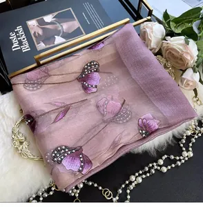 Detailed view of lavender silk blend scarf with 3D floral embroidery and pearl beadwork