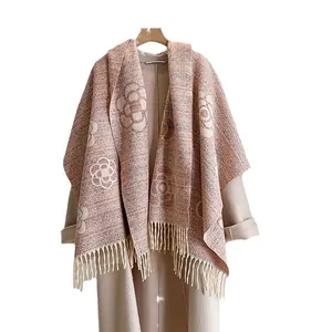 Elegant woven camellia shawl with fringes in warm beige and pink mixed knit fabric