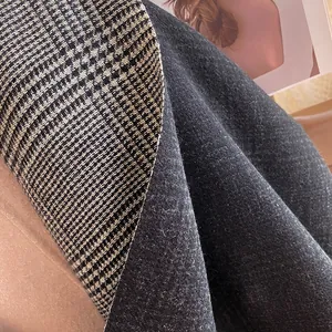 Winter plaid scarf with double-sided design in black white houndstooth and grey wool texture