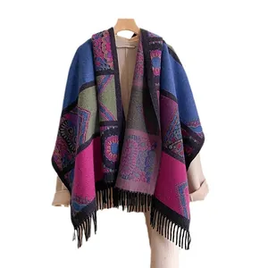Bohemian patterned knit shawl with colorful patchwork floral design and black tassels