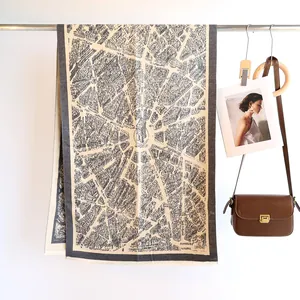 Detail of pashmina scarf with vintage Paris city map print and soft fringe edges