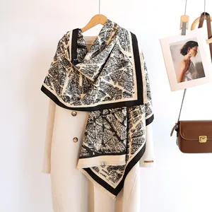 Close-up of black and white architectural print on soft winter cashmere-feel shawl