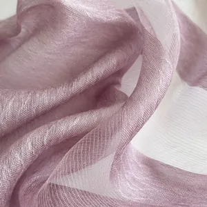 Detailed macro view of light purple silk scarf showing delicate sheer texture and fine weave
