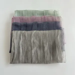Elegant pleated silk-feel scarf for women in pastel green, pink, and grey shades