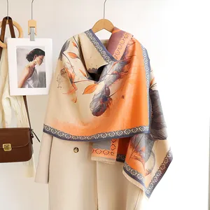 Chinese style beige cashmere scarf with orange floral patterns and elegant fringe trim