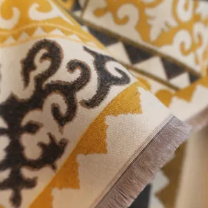 Close-up of bohemian horse pattern jacquard scarf with delicate tassel details