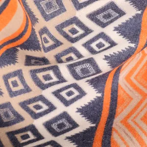 Ethnic Mayan style double-sided cashmere-like shawl with orange and blue geometric patterns